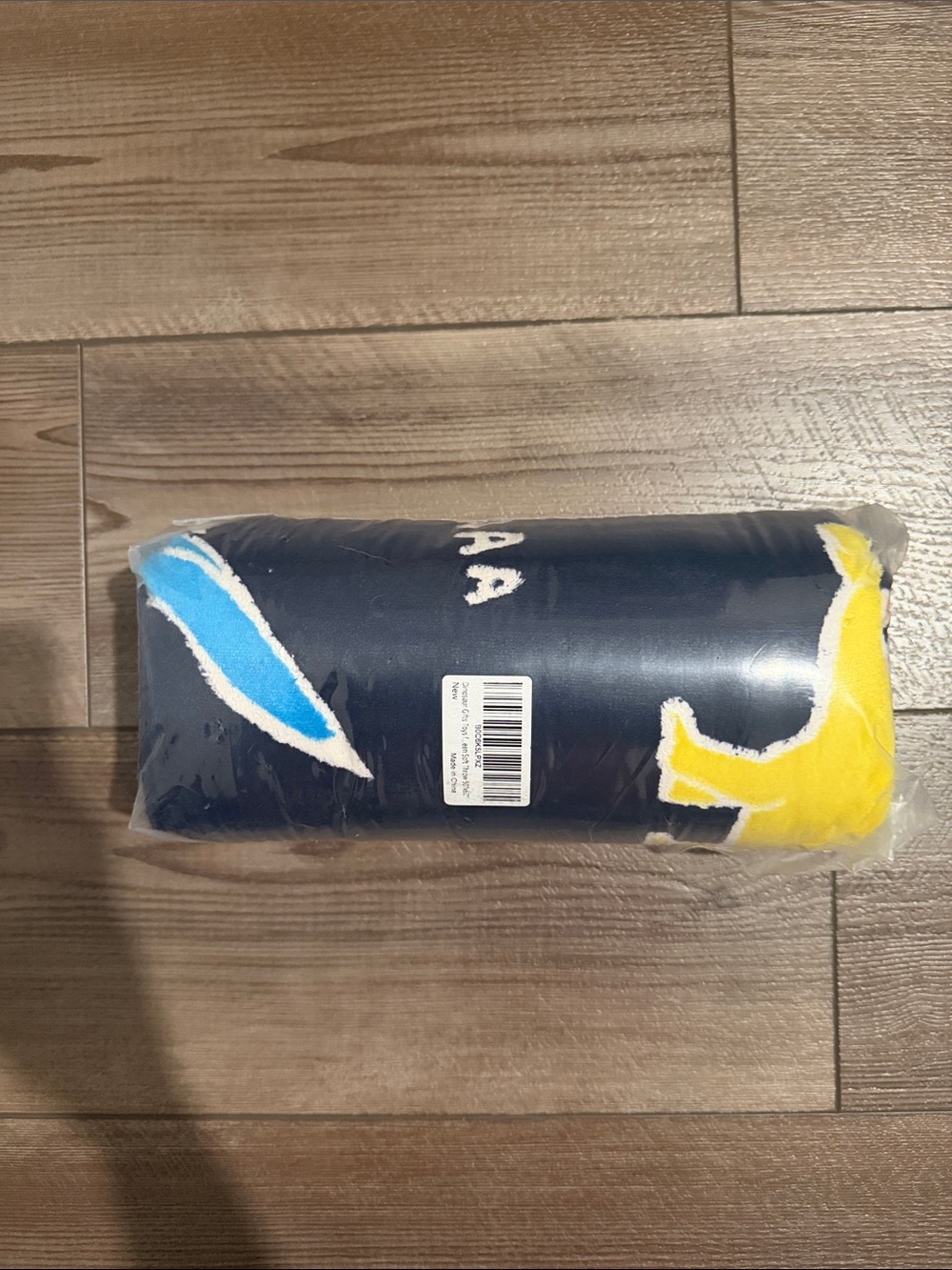Navy Blue Dinosaur Throw with Yellow & Light Blue Accents